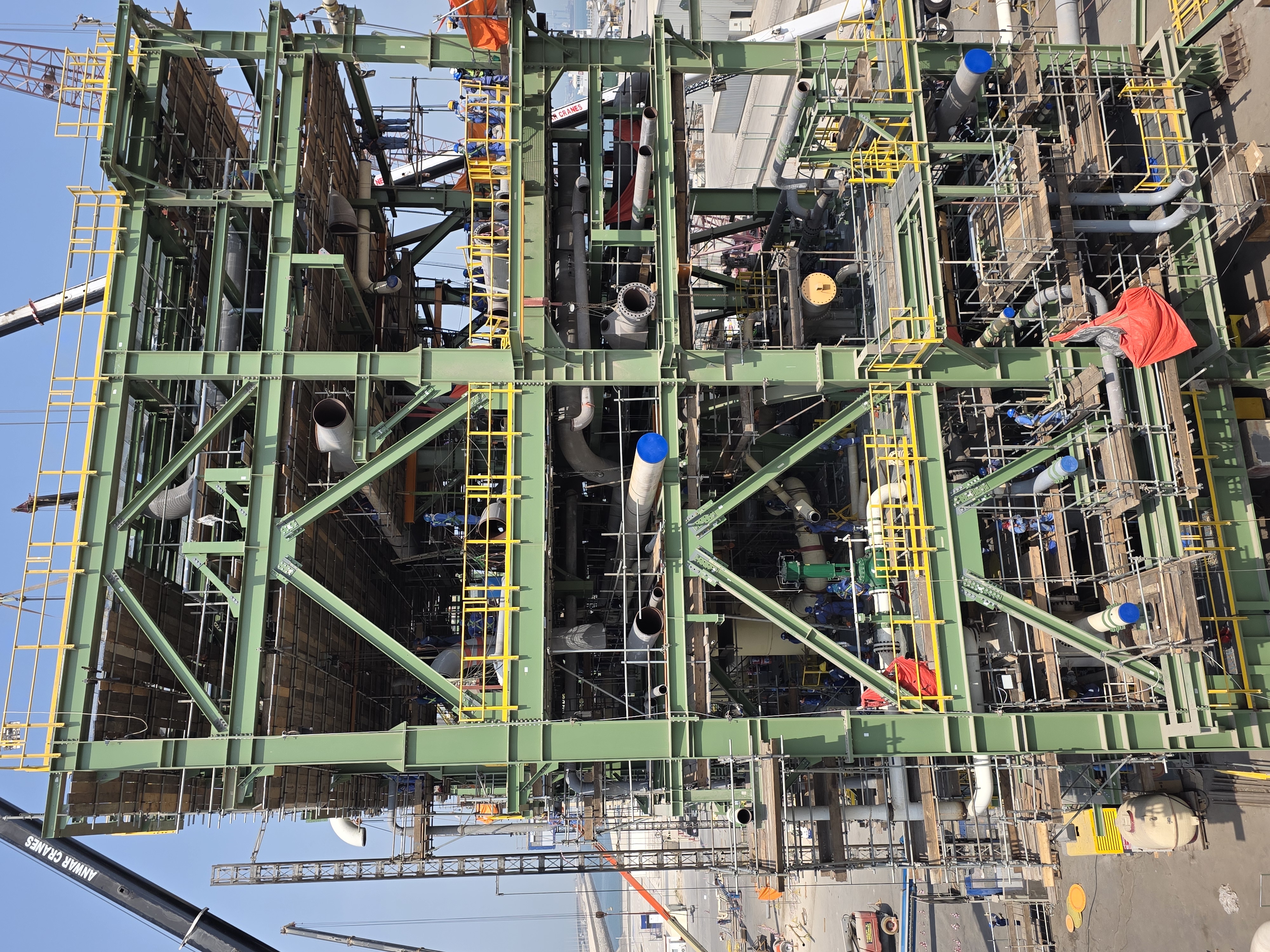 Packaged spools on transport skid